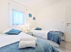 Apartments with a parking space Gornji Picudo, Umag - 22354