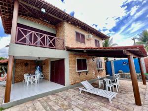 A private chale less than 20 feet from the ocean