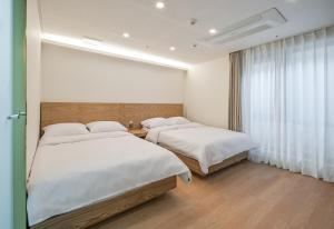 Suite Gia Đình Deluxe (Deluxe Family Suite)