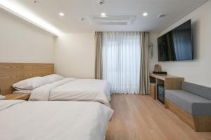 Suite Gia Đình Deluxe (Deluxe Family Suite)