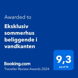 Eksklusiv sommerhus beliggende i vandkanten