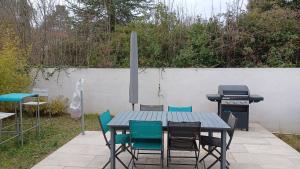 Villas Maison de 120M avec jardin : photos des chambres