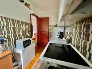 Appartamento per Famiglie in Centro ad Asiago con Posto Auto e Ampio Giardino