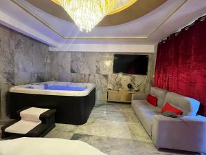 Appartements Golden Love - Jacuzzi : photos des chambres