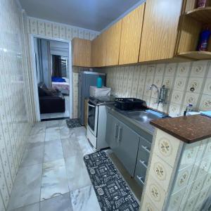 Apartamento kitnet pé na areia praia Ocian