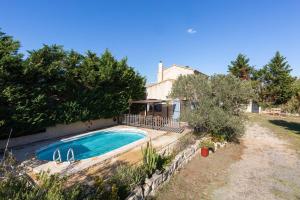 Maisons de vacances Mas Provencal de 120m2 en Camargue, Avec Piscine et Parking inclus, Ideal pour des vacances : photos des chambres