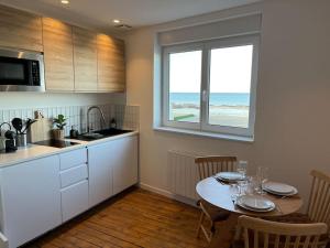 Appartements L'Horizon - Duplex face a la Mer tout confort : photos des chambres