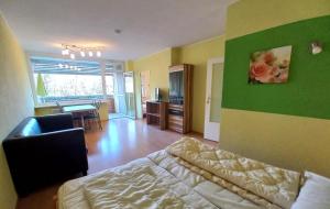SANDRA Haus KMB Seeappartement am Ossiacher See mit direktem Seezugang und Hallenbad