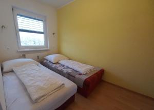 SANDRA Haus KMB Seeappartement am Ossiacher See mit direktem Seezugang und Hallenbad