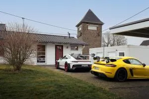 Racing-Chalet (Ferienhaus) - Meuspath