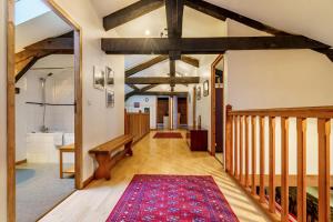 Maisons de vacances The Coach House - Avec piscine partagee : photos des chambres