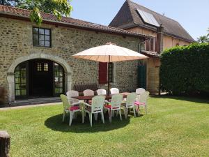 Maisons de vacances The Coach House - Avec piscine partagee : photos des chambres