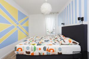 Appartements Appartement Cosy Pres de Paris avec vue sur la Tour Eiffel - Parking & Wifi : photos des chambres