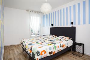 Appartements Appartement Cosy Pres de Paris avec vue sur la Tour Eiffel - Parking & Wifi : photos des chambres