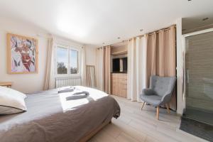 Maisons de vacances Le Chemin de la Grave - Maison avec piscine : photos des chambres