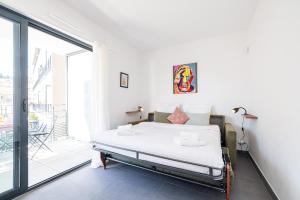 Appartements Queen Riviera : climatisation, parking, terrasse : photos des chambres