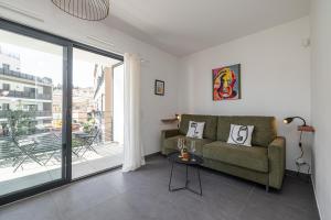 Appartements Queen Riviera : climatisation, parking, terrasse : photos des chambres