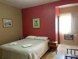 Edificio Verona quarto com 1 cama de casal + 1 cama solteiro - Balsa Nova