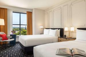 Queen Room with Two Queen Beds room in 106 Jefferson Huntsville Curio Collection by Hilton