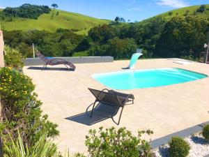 obrázek - Recanto da Alegria - Casa em Cunha com Piscina, Churrasqueira,Lareira,Deck