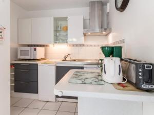 Appartement Calme Proche Plage avec Terrasse Sud, Parking Sécurisé et Équipements Complets - FR-1-306-909