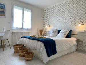 B&B / Chambres d'hotes Appartement Confort avec Suite Parentale et Equipements pour Bebe a Saint-Michel-Chef-Chef - FR-1-306-1232 : photos des chambres