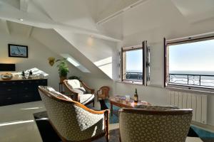 LOstra 2 - Appartement avec mezzanine, front de mer à Cancale sur le Port de La Houle