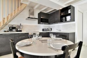 LOstra 2 - Appartement avec mezzanine, front de mer à Cancale sur le Port de La Houle