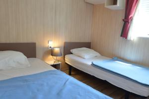 Campings Camping Municipal Tindio : photos des chambres