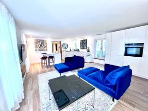 Appartements Cocon douillet de 70m2 au dessus de la ville de Tours, avec Balneo, Clim, Terrasse, et parking sous terrain : photos des chambres