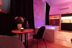 Appartements Evasion Spa : photos des chambres