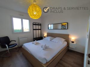 Maisons de vacances TY FLOSQUE - Jolie maison familiale proche plage : photos des chambres