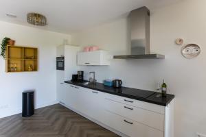 Vakantiehuis aan het water met hottub