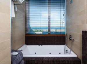 Junior Suite with Jacuzzi and Sea View room in Best Western Maison B Hotel