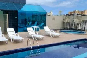 Apart-hotel na praia com piscina - Cubatão