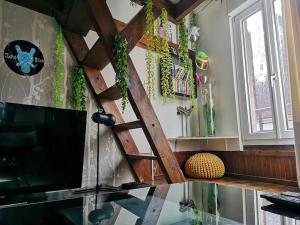Appartements Atelier d’artiste proche Paris Gare nord/Stade de FR/CDG : photos des chambres