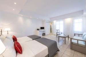 Junior Suite with Front View Garden room in Stelia Mare Boutique Hotel