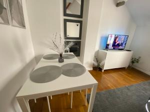 Appartements Duplex Minimaliste - 30 min Paris : photos des chambres