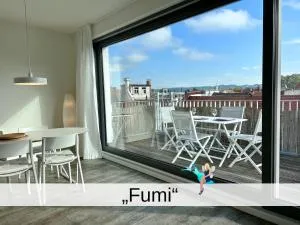 Ferienwohnung Fumi - Maisonette im sanierten Altbau mit großer Dachterrasse und Blick über die Insel - Äschach