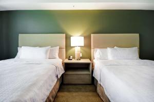 Queen Studio with Two Queen Beds - Non-Smoking room in Homewood Suites By Hilton Greenville Downtown