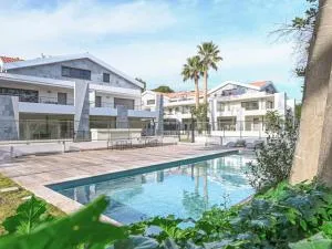 Appartement à 150m plage des Lecques, climatisé, piscine, terrasse, 2 chambres, parking - 4 étoiles - FR-1-770-29 - 拉卡迪埃达聚