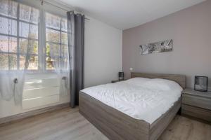 Appartements Appartement pour 4 avec grand jardin : photos des chambres