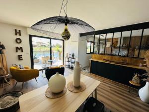 Maisons de vacances Maison Ostrea terrasse sur l'eau : photos des chambres