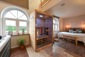 Maisons de vacances Instinct - Jacuzzi, Sauna, Aperitif dinatoire et Petit dejeuner : photos des chambres