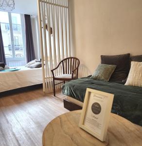 Appartements EPICURIEUX hyper centre ville, calme - SEJOURAIXLESBAINS : photos des chambres