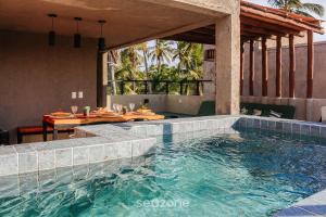 LBH - Casas em condomínio com piscina e churrasqueira.