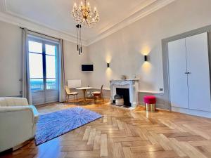 Appartements Appartement bourgeois avec terrasse et vue lac : photos des chambres