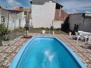 CASA COM PISCINA EM BALNEÁRIO PINHAL RS - Mostardas