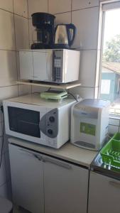 Ótimo apartamento com ampla sacada e vista pro mar