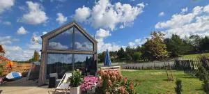 Domek mazurski całoroczny nad jeziorem z jacuzzi SPA - Pasym